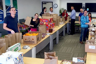 Image of ESET employees preparing donations for local food bank.